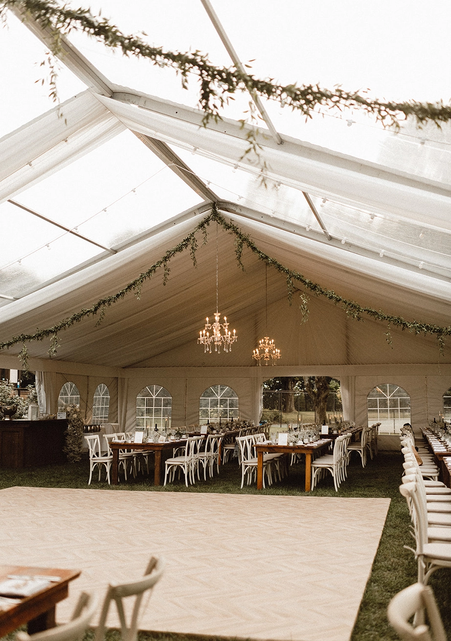 Dance floor setup inside tented event